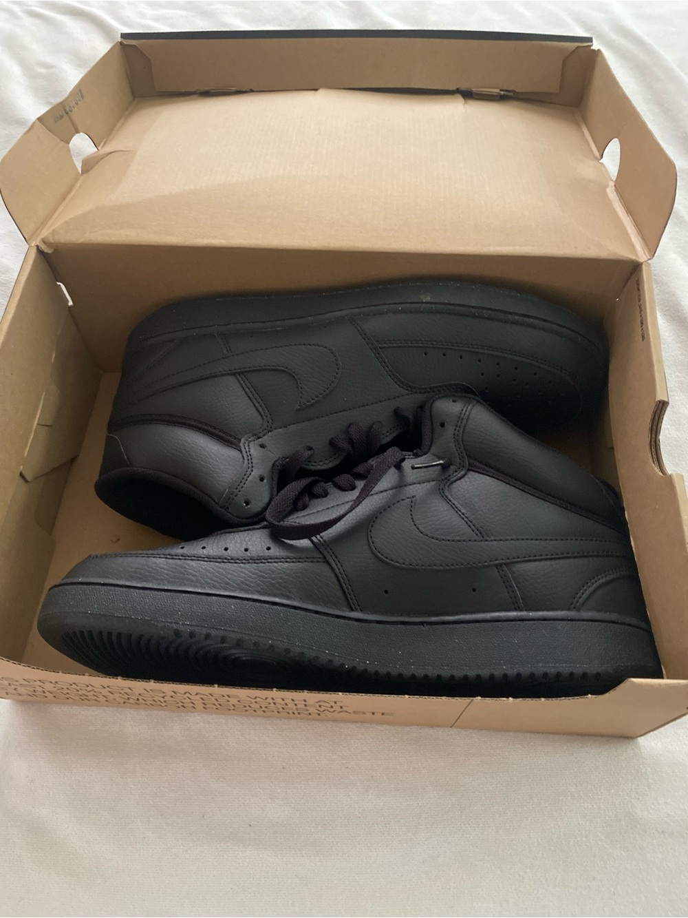 Nike Men’s Black Low-Top Leather Sneakers